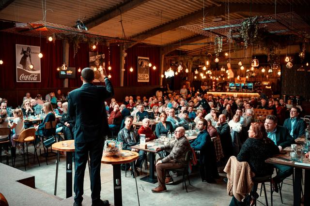 An audience at a conference